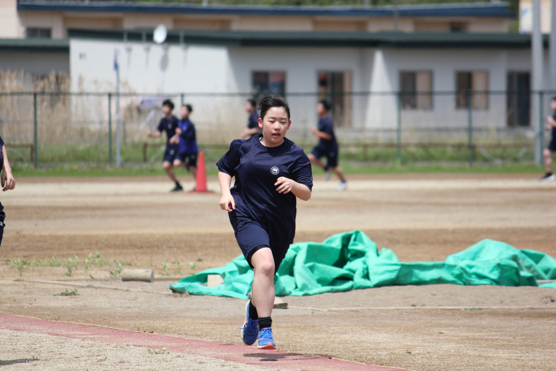 つらさが表情に・・・　長距離走 3枚目写真